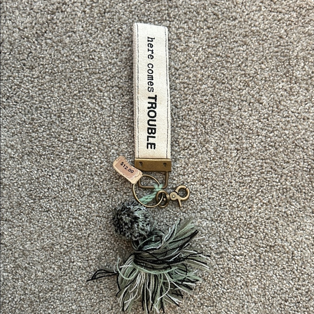 Here Comes Trouble Keychain with Tassel